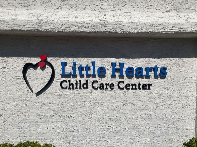 Little Hearts Child Care Center Building Sign
